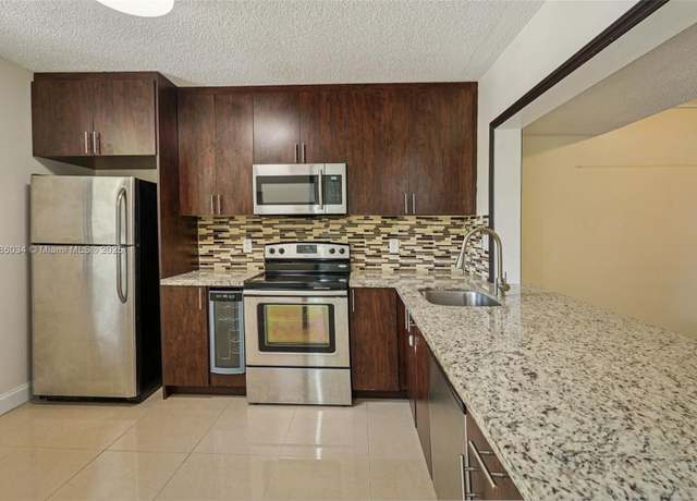 Property at 3100 NW 42nd Ave Unit D202, Coconut Creek, FL 33066, 2 beds, 2 baths