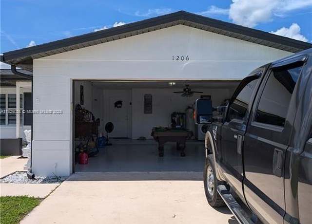 Property at 1206 Archdale St, Lehigh Acres, FL 33936, 3 beds, 2 baths