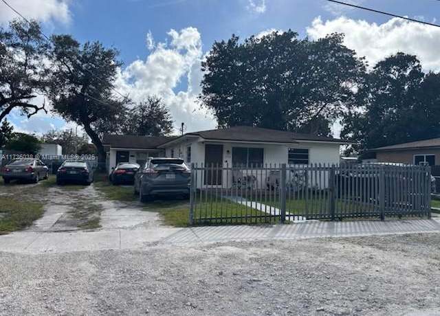 Property at 2430 NW 99th St, Miami, FL 33147, 5 beds, 3 baths