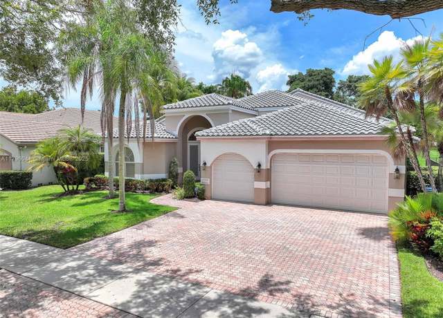 Property at 2623 Oakbrook Dr, Weston, FL 33332, 5 beds, 3 baths