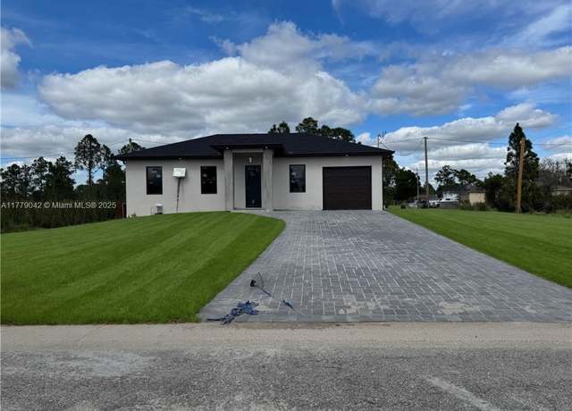 Property at 607 E 8th St, Lehigh Acres, FL 33972, 3 beds, 3 baths
