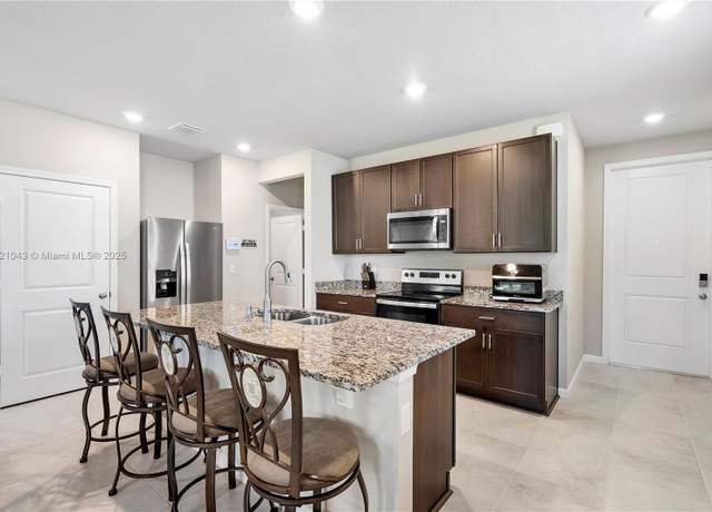 Property at 5720 Mentmore Dr, Mangonia Park, FL 33407, 3 beds, 2.5 baths