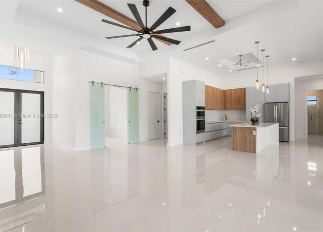 Property at 10 SW 33rd Ave, FL 33991, 3 beds, 3.5 baths