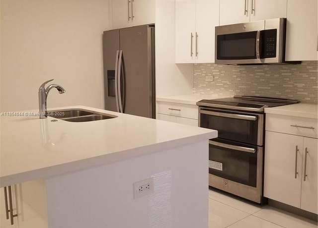 Property at 2651 NE 212th Ter #103, Miami, FL 33180, 2 beds, 2 baths