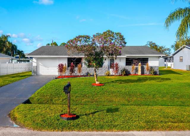 Property at 143 SW Grove Ave, Port St. Lucie, FL 34983, 4 beds, 2 baths