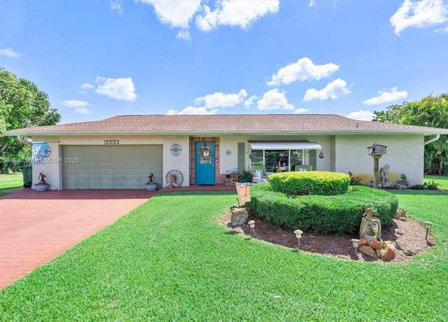 Property at 7306 NW 95th Way, Tamarac, FL 33321, 3 beds, 2 baths