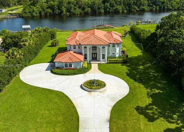 Property at 6152 SW Banks St, Palm City, FL 34990, 9 beds, 5 baths