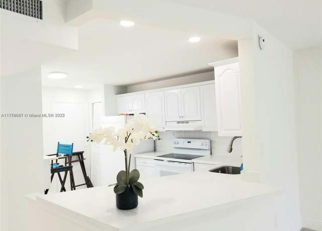 Property at 1670 NE 191st St Unit 404-3, Miami, FL 33179, 1 bed, 1.5 baths