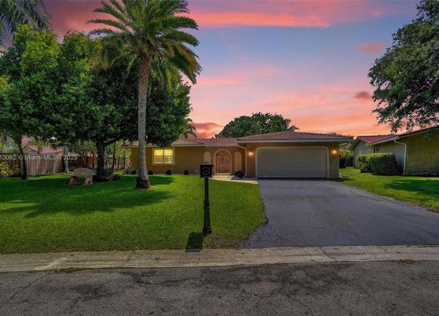 Property at 8438 NW 26th Dr, Coral Springs, FL 33065, 4 beds, 3 baths