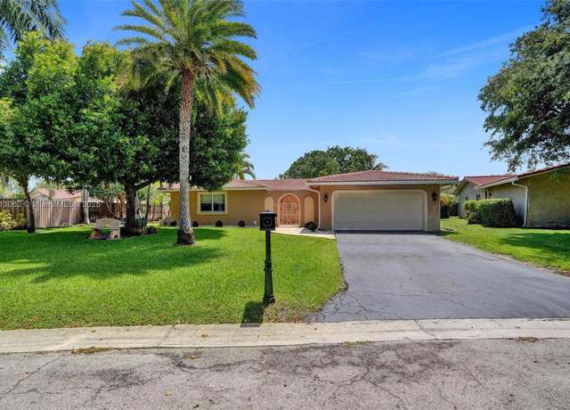 Property at 8438 NW 26th Dr, Coral Springs, FL 33065, 4 beds, 3 baths