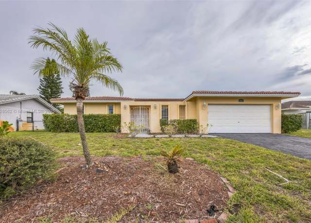 Property at 867 Ramblewood Dr, Coral Springs, FL 33071, 3 beds, 2 baths