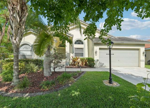 Property at 5708 NW 47th Ct, Coral Springs, FL 33067, 4 beds, 2 baths
