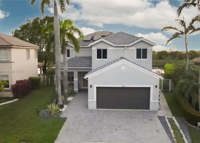 Property at 1828 Aspen Ln, Weston, FL 33327, 5 beds, 4.5 baths