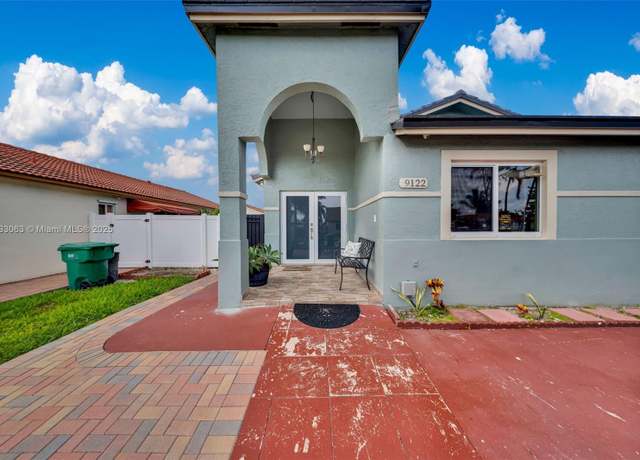 Property at 9122 NW 113th St, Hialeah Gardens, FL 33018, 4 beds, 2 baths