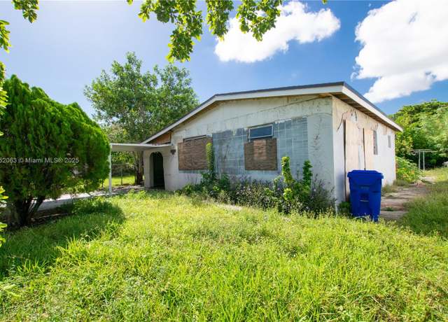 Property at 826 NW 56th St, Miami, FL 33127, 8 beds, 4 baths