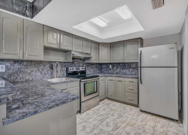 Property at 94 Pleasant Hill Ln, Tamarac, FL 33319, 4 beds, 2.5 baths