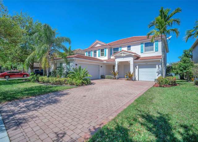 Property at 9345 Madewood Ct, Royal Palm Beach, FL 33411, 5 beds, 4 baths