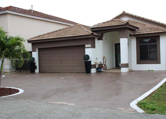 Property at 19602 NW 83rd Ct, Hialeah, FL 33015, 4 beds, 2 baths