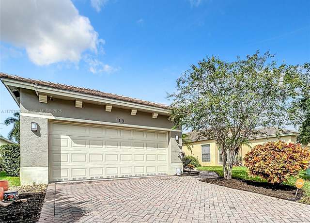 Property at 310 SW Tomoka Springs Dr, Port St. Lucie, FL 34986, 3 beds, 2 baths