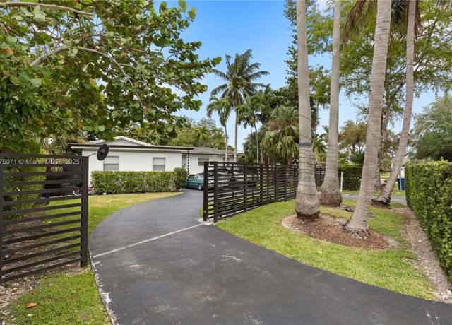 Property at 11810 W Biscayne Canal Rd, Miami, FL 33161, 3 beds, 2 baths