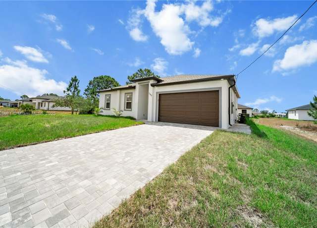 Property at 740 Newhall St E, Lehigh Acres, FL 33974, 3 beds, 2 baths