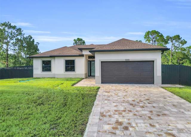 Property at 1300 W 11th St, Lehigh Acres, FL 33972, 3 beds, 2 baths