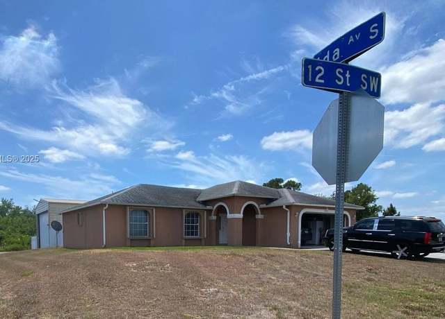 Property at 2901 12 St SW, Lehigh Acres, FL 33976, 3 beds, 2 baths