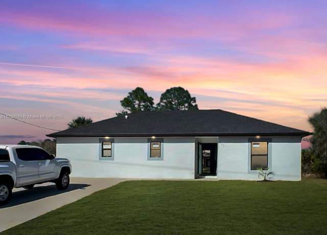 Property at 202 Hagan St S, Lehigh Acres, FL 33974, 3 beds, 2 baths