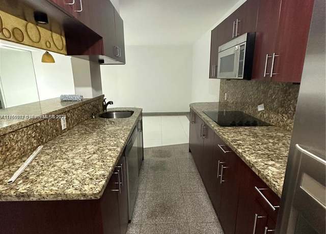 Property at 1100 NE 1st Ct #105, Hallandale Beach, FL 33009, 1 bed, 1 bath
