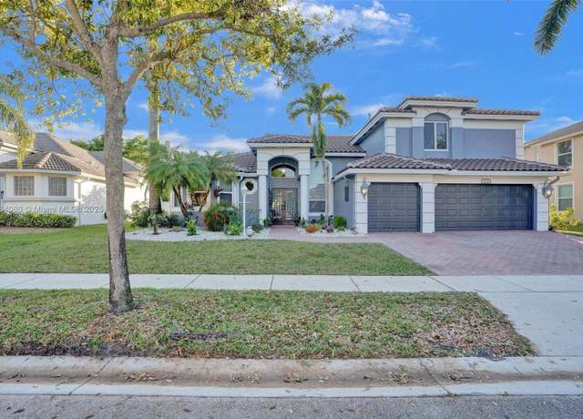 Property at 1322 NW 139th Ave, Pembroke Pines, FL 33028, 5 beds, 3.5 baths