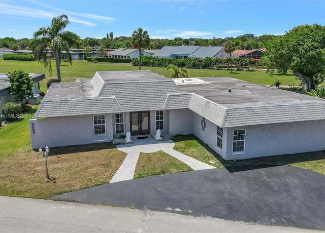 Property at 5509 Mulberry Dr, Tamarac, FL 33319, 4 beds, 3 baths