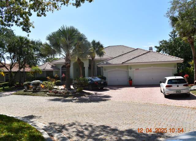 Property at 12044 NW 9th Pl, Coral Springs, FL 33071, 5 beds, 4.5 baths