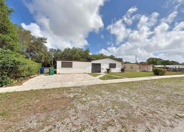 Property at 1910 NW 163rd St Rd, Miami Gardens, FL 33054, 4 beds, 3 baths