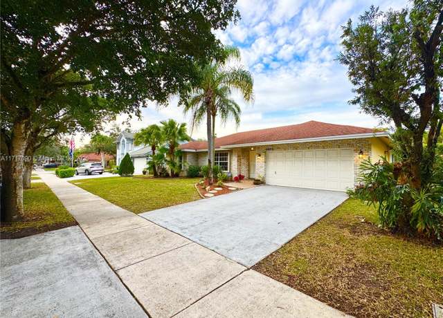 Property at 4853 NW 50th Ct, Coconut Creek, FL 33073, 4 beds, 2 baths