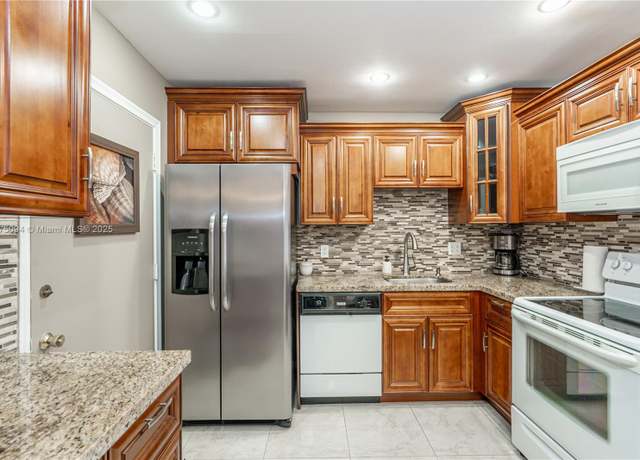 Property at 4851 NW 21st St #214, Lauderhill, FL 33313, 1 bed, 1.5 baths