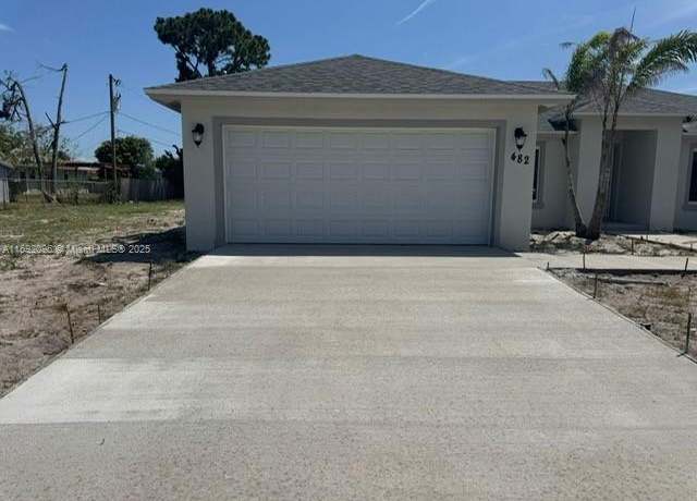 Property at 482 NW Marion Ave, Port St. Lucie, FL 34953, 4 beds, 3 baths