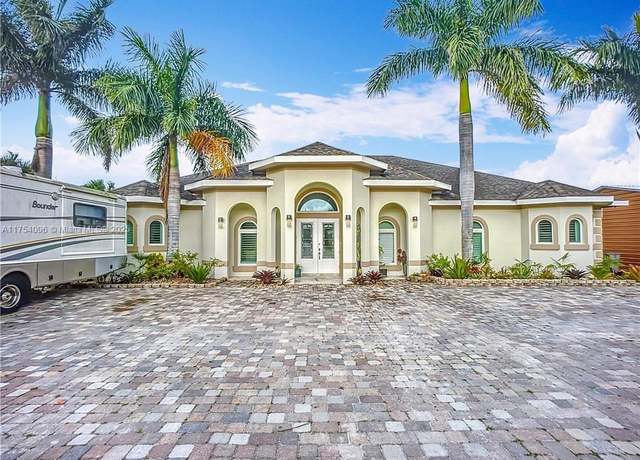 Property at 7684 County Rd 78, La Belle, FL 33935, 5 beds, 5.5 baths