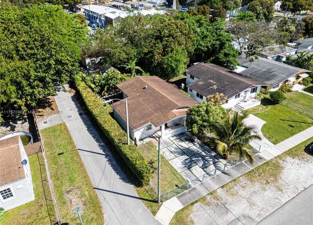Property at 1243 NW 42nd St, Miami, FL 33142, 3 beds, 2 baths