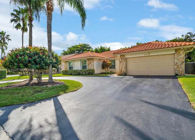 Property at 10968 NW 13th Ct, Coral Springs, FL 33071, 4 beds, 2 baths
