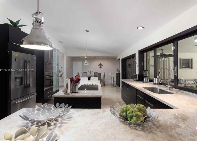 Property at 1000 E Cypress Dr, Pompano Beach, FL 33069, 4 beds, 3 baths