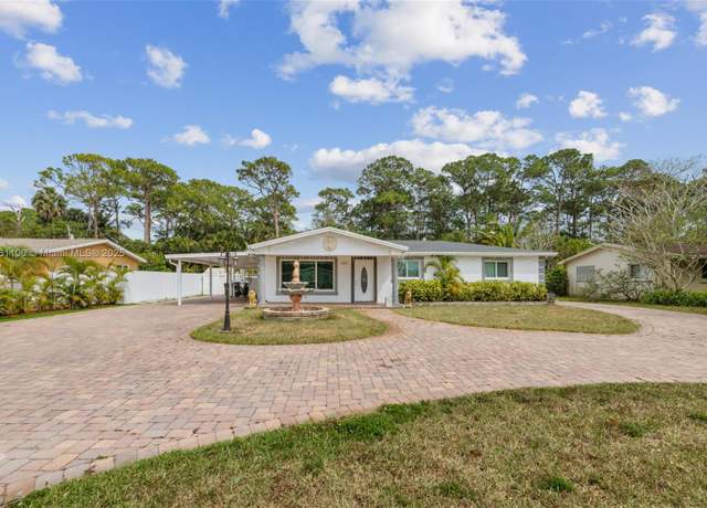 Property at 410 Forest Estate Dr, West Palm Beach, FL 33415, 4 beds, 3 baths