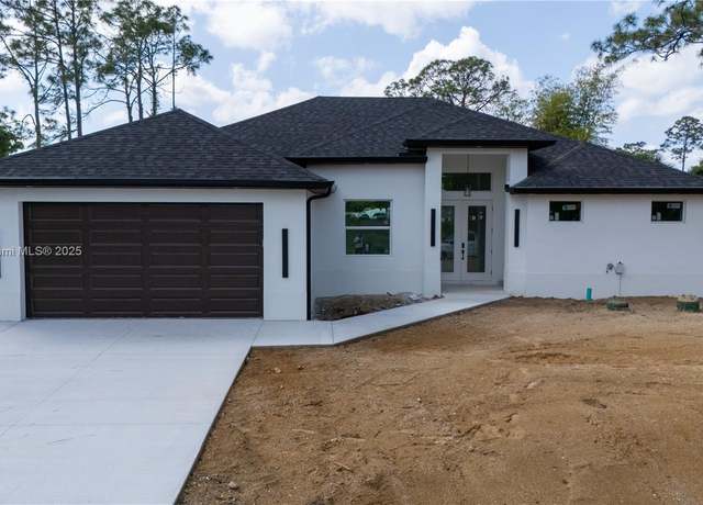 Property at 3111 W 17th St W, Lehigh Acres, FL 33971, 3 beds, 2 baths