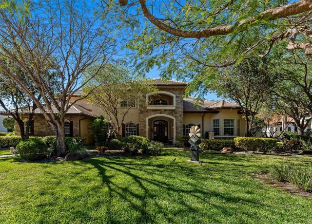 Property at 12483 Grand Oaks Dr, Davie, FL 33330, 6 beds, 5.5 baths