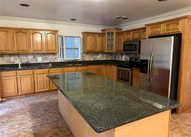 Property at 12027 SW 273rd St, Homestead, FL 33032, 5 beds, 3 baths