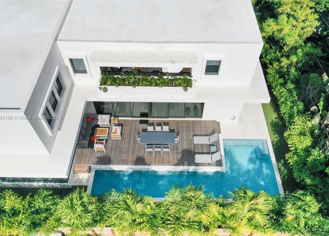 Property at 7501 Coquina Dr, North Bay Village, FL 33141, 5 beds, 5.5 baths