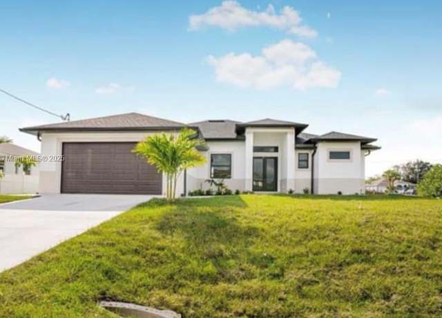 Property at 2517 44th St SW, Lehigh Acres, FL 33976, 4 beds, 2 baths
