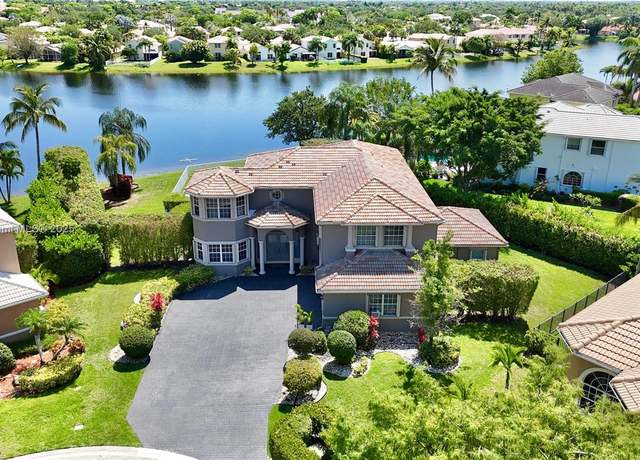 Property at 5081 NW 120th Ave, Coral Springs, FL 33076, 6 beds, 5 baths