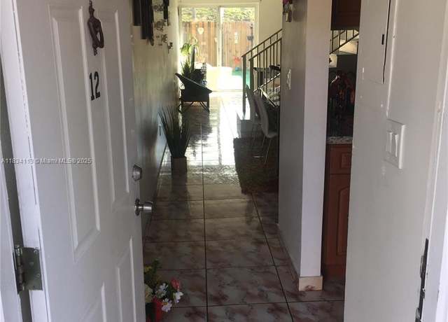 Property at 16700 NW 55th Ave #12, Miami Gardens, FL 33055, 2 beds, 1.5 baths