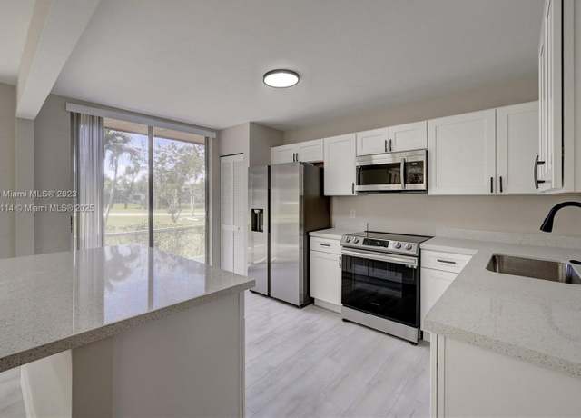 Property at 7582 NW 86th Ter #104, Tamarac, FL 33321, 3 beds, 2 baths