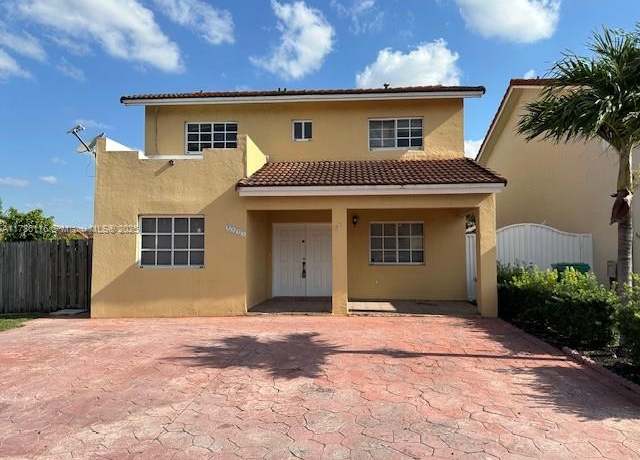 Property at 9825 NW 122nd Ter, Hialeah Gardens, FL 33018, 4 beds, 2.5 baths